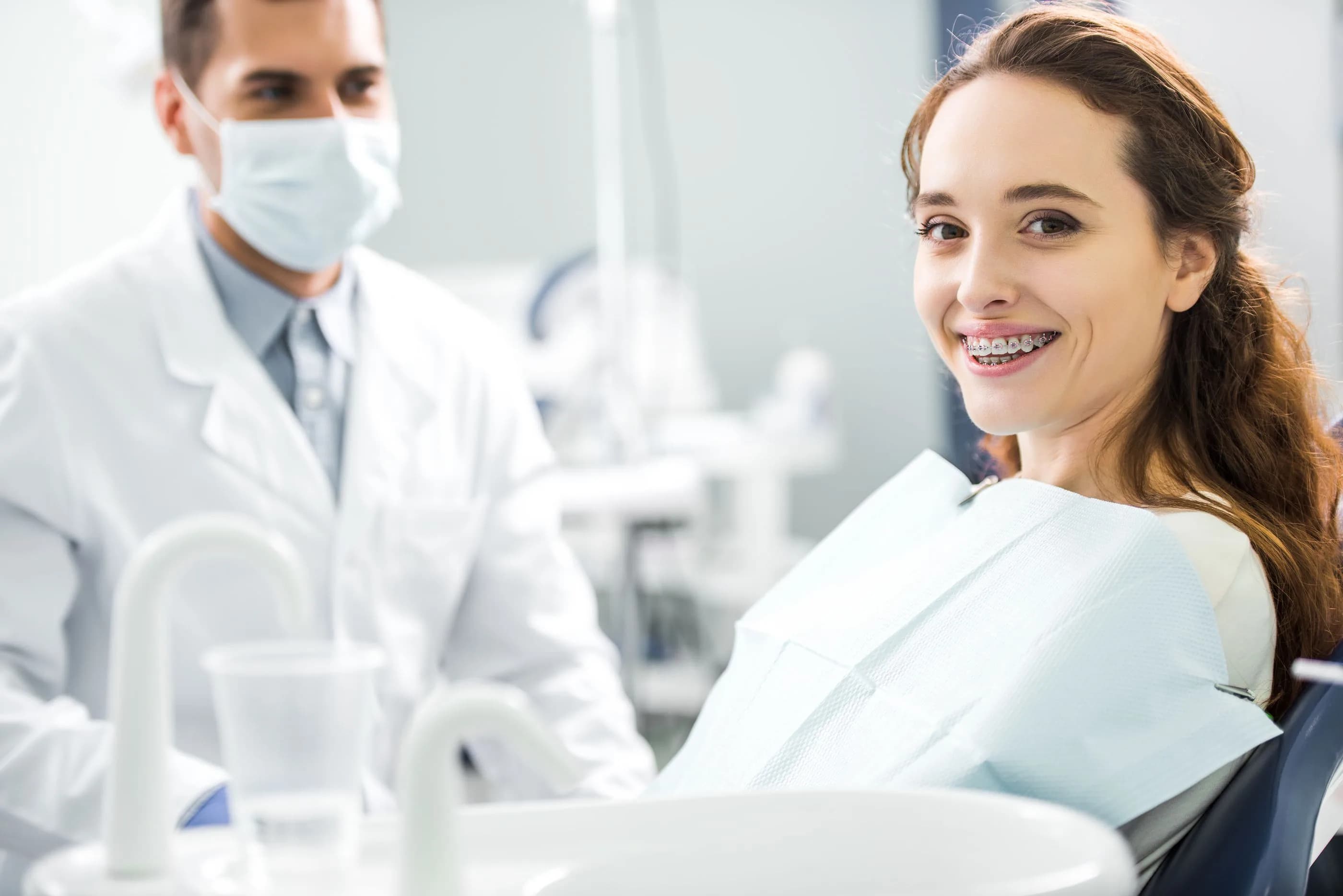 Invisalign clear aligners and traditional braces at Royal Oak Smiles